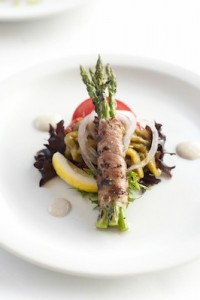 Grilled Proscuitto Wrapped Wild Asparagus, Roasted Peppers, Toasted Red Chile Crema